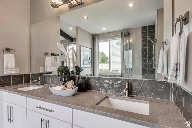 873 S 120 W Unit 003, American Fork, UT 84003 - bathroom featuring tasteful backsplash, double vanity, a stall shower, and recessed lighting