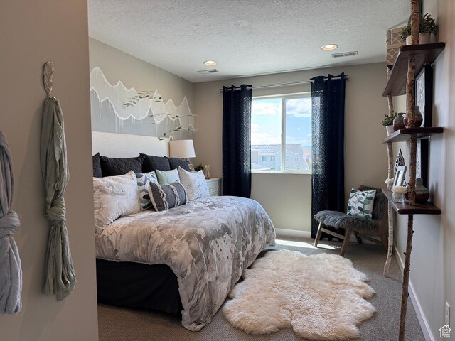 873 S 120 W Unit 003, American Fork, UT 84003 - bedroom featuring light colored carpet, a textured ceiling, baseboards, and recessed lighting