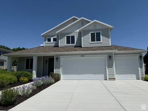873 S 120 W Unit 003, American Fork, UT 84003 - craftsman house with concrete driveway, a garage, and board and batten siding