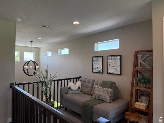 873 S 120 W Unit 003, American Fork, UT 84003 - living area featuring a chandelier, recessed lighting, and a textured ceiling