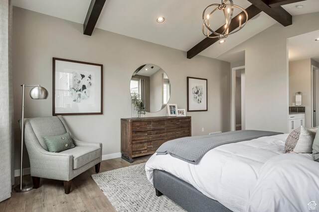 873 S 120 W Unit 003, American Fork, UT 84003 - bedroom with a chandelier, wood finished floors, recessed lighting, ensuite bathroom, and baseboards