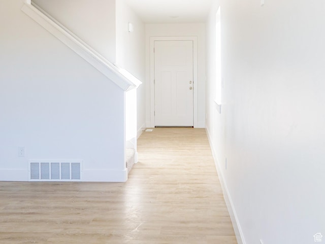 815 N 216 W Unit 23, Nephi, UT 84648 - corridor with light wood-style flooring and baseboards