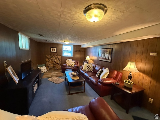 272 E 3000 N, North Ogden, UT 84414 - living area with wood walls, plenty of natural light, and carpet flooring