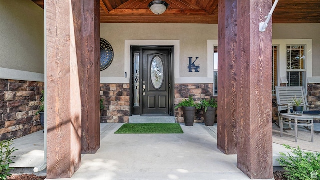 1988 Fieldstone Ln, Heber City, UT 84032 - entrance to property with stucco siding, stone siding, and a porch