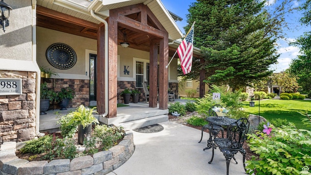 1988 Fieldstone Ln, Heber City, UT 84032 - property entrance featuring covered porch, stone siding, and stucco siding