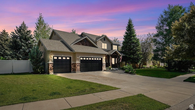 1988 Fieldstone Ln, Heber City, UT 84032 - craftsman-style house with concrete driveway, stone siding, a garage, roof with shingles, and stucco siding