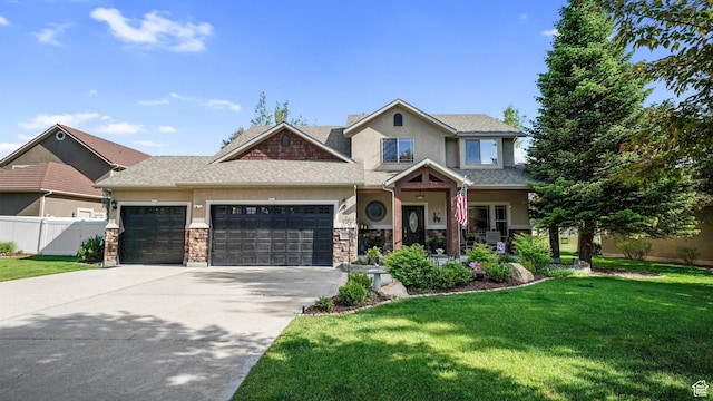 1988 Fieldstone Ln, Heber City, UT 84032 - craftsman-style home featuring a garage, concrete driveway, stucco siding, stone siding, and covered porch