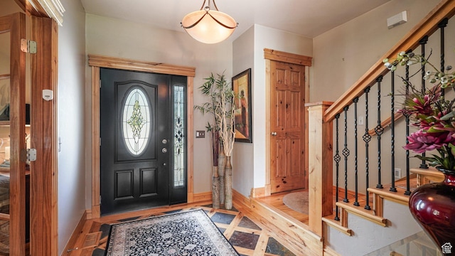 1988 Fieldstone Ln, Heber City, UT 84032 - entryway featuring stairway, baseboards, and wood finished floors