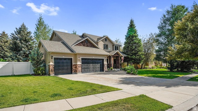 1988 Fieldstone Ln, Heber City, UT 84032 - craftsman house featuring driveway, a garage, stucco siding, stone siding, and roof with shingles