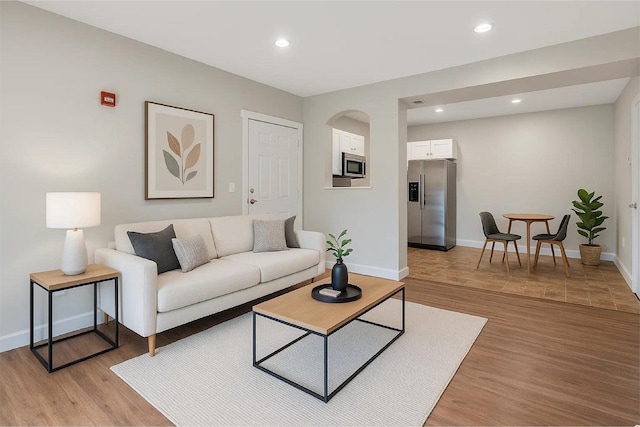 109 W Spring Hill Way, Saratoga Springs, UT 84045 - living area with baseboards, light wood finished floors, and recessed lighting