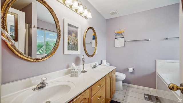 677 E 110 N, Heber City, UT 84032 - bathroom featuring double vanity, a garden tub, baseboards, toilet, and tile patterned floors