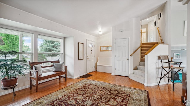 677 E 110 N, Heber City, UT 84032 - entrance foyer featuring stairway, wood finished floors, vaulted ceiling, and baseboards