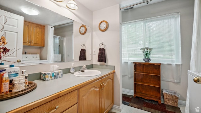 677 E 110 N, Heber City, UT 84032 - full bath with vanity, washer / clothes dryer, and baseboards