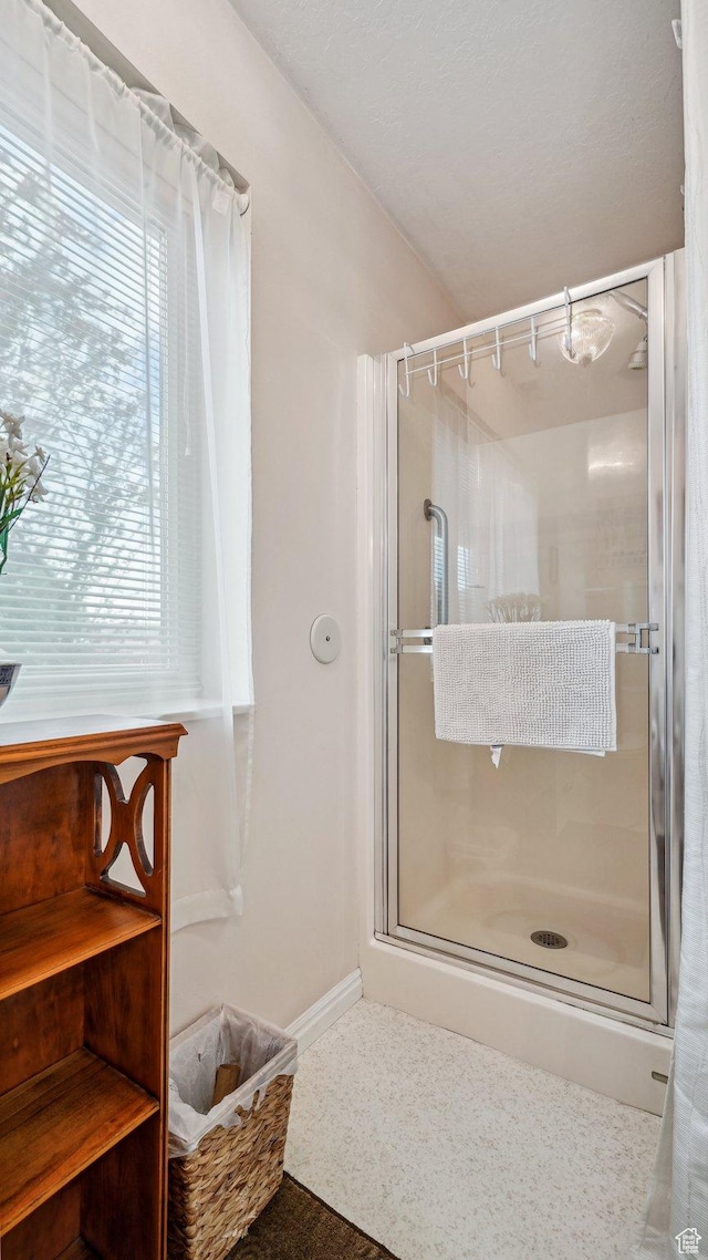 677 E 110 N, Heber City, UT 84032 - bathroom with a stall shower, plenty of natural light, and baseboards