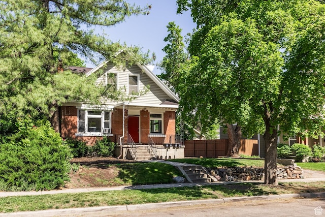 2269 S Green St Unit 1-4, Salt Lake City, UT 84106 - bungalow-style house featuring brick siding and covered porch