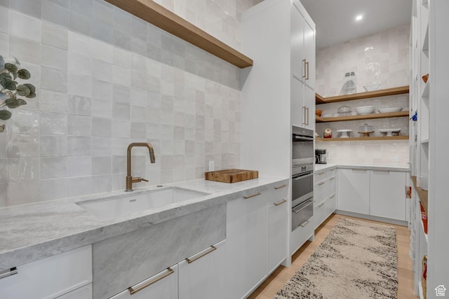 1735 Red Hawk Trl, Park City, UT 84098 - kitchen featuring open shelves, a sink, decorative backsplash, a warming drawer, and recessed lighting