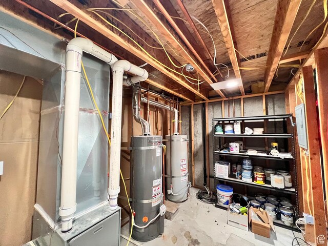 505 W 300 N, Orangeville, UT 84537 - unfinished basement featuring strapped water heater and gas water heater