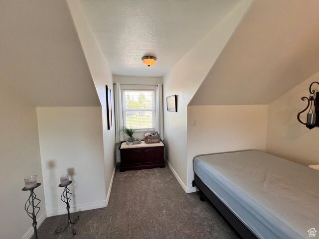 505 W 300 N, Orangeville, UT 84537 - bedroom featuring dark colored carpet and baseboards