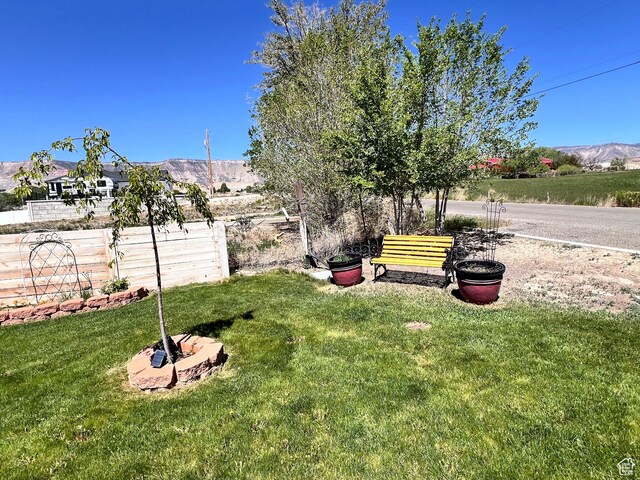 505 W 300 N, Orangeville, UT 84537 - view of green lawn featuring a mountain view