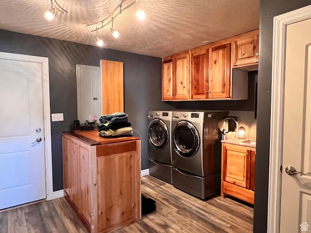 505 W 300 N, Orangeville, UT 84537 - washroom featuring washing machine and clothes dryer, electric panel, wood finished floors, and cabinet space