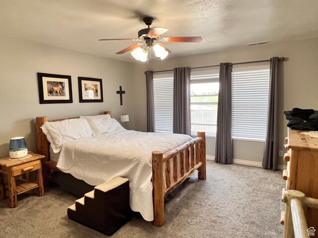 505 W 300 N, Orangeville, UT 84537 - bedroom with light colored carpet, baseboards, and ceiling fan