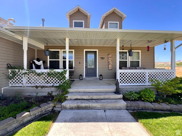 505 W 300 N, Orangeville, UT 84537 - view of front of house with a porch