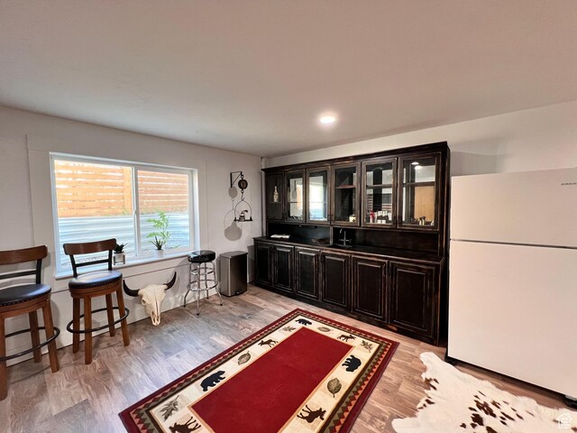 505 W 300 N, Orangeville, UT 84537 - bar area with freestanding refrigerator and light wood-style floors