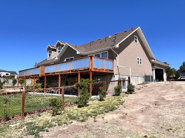 505 W 300 N, Orangeville, UT 84537 - rear view of house with central air condition unit and a wooden deck
