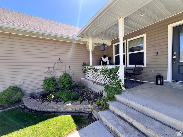 505 W 300 N, Orangeville, UT 84537 - entrance to property featuring covered porch and roof with shingles