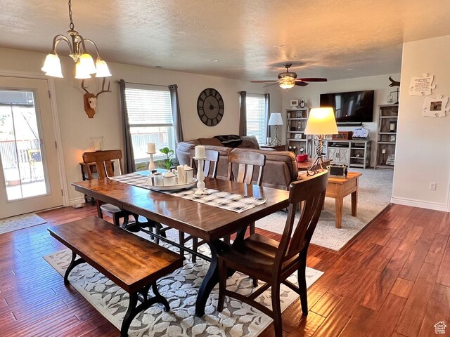 505 W 300 N, Orangeville, UT 84537 - dining room featuring dark wood finished floors, healthy amount of natural light, ceiling fan, and a textured ceiling