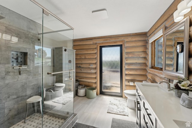 6380 N Silver Sage Dr, Park City, UT 84098 - full bath featuring toilet, rustic walls, double vanity, and a shower stall