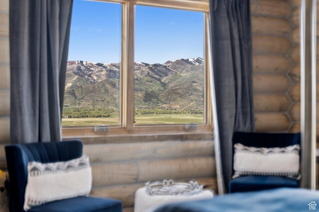 6380 N Silver Sage Dr, Park City, UT 84098 - sitting room with log walls and a mountain view