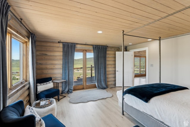 6380 N Silver Sage Dr, Park City, UT 84098 - bedroom with wooden ceiling, multiple windows, rustic walls, access to exterior, and recessed lighting