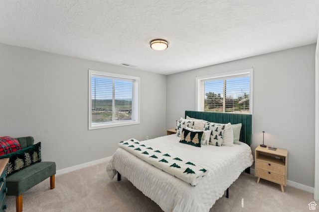 6380 N Silver Sage Dr, Park City, UT 84098 - bedroom featuring light colored carpet, multiple windows, and baseboards