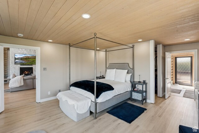 6380 N Silver Sage Dr, Park City, UT 84098 - bedroom with wood ceiling, multiple windows, recessed lighting, light wood-style floors, and baseboards