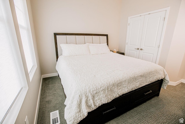 5028 W Lake Terrace Ave, South Jordan, UT 84009 - carpeted bedroom featuring baseboards and a closet