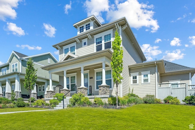 5028 W Lake Terrace Ave, South Jordan, UT 84009 - american foursquare style home with covered porch and a front yard