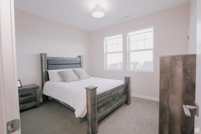 5028 W Lake Terrace Ave, South Jordan, UT 84009 - bedroom with light carpet and baseboards