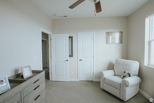 5028 W Lake Terrace Ave, South Jordan, UT 84009 - living area with light colored carpet, ceiling fan, and baseboards