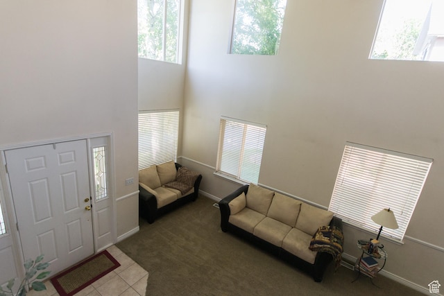 274 E Park Knoll Cir, Sandy, UT 84070 - carpeted foyer entrance featuring a high ceiling, plenty of natural light, and baseboards