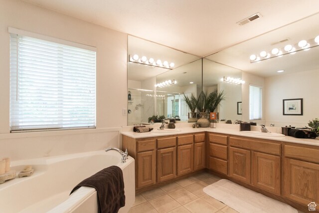 274 E Park Knoll Cir, Sandy, UT 84070 - bathroom with a shower stall, tile patterned flooring, a garden tub, double vanity, and plenty of natural light