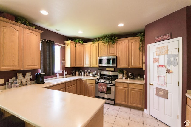 274 E Park Knoll Cir, Sandy, UT 84070 - kitchen featuring appliances with stainless steel finishes, a sink, a peninsula, light countertops, and recessed lighting