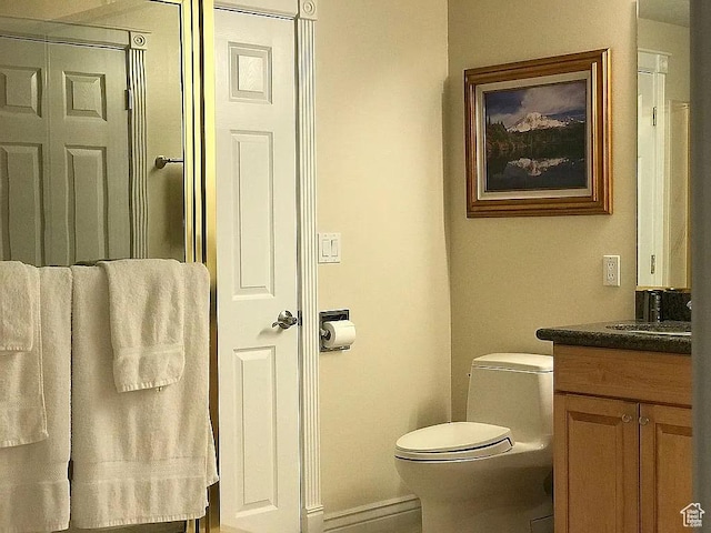 4093 Imperial Way, Provo, UT 84604 - bathroom featuring vanity, toilet, and baseboards