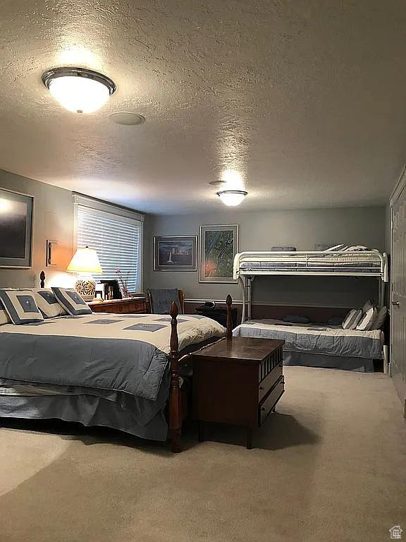 4093 Imperial Way, Provo, UT 84604 - bedroom featuring a textured ceiling and carpet floors