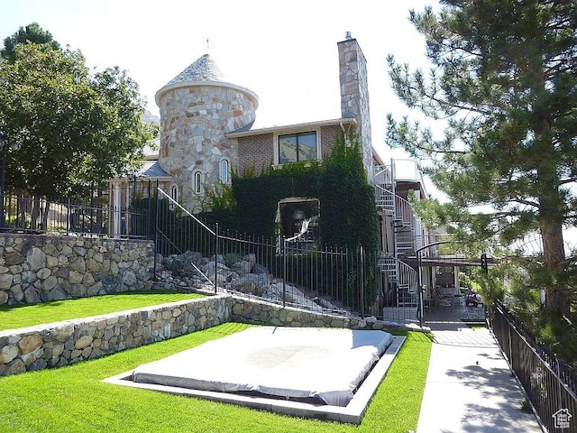 4093 Imperial Way, Provo, UT 84604 - back of property with stairway, community basketball court, and a chimney