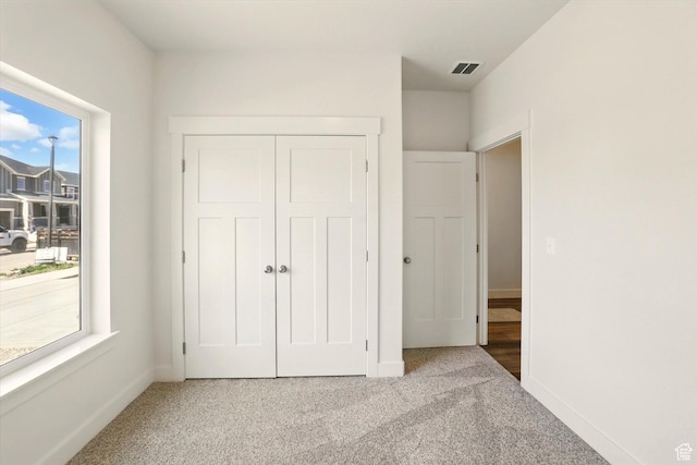 222 W 825 S, Willard, UT 84340 - unfurnished bedroom featuring carpet floors, a closet, and baseboards