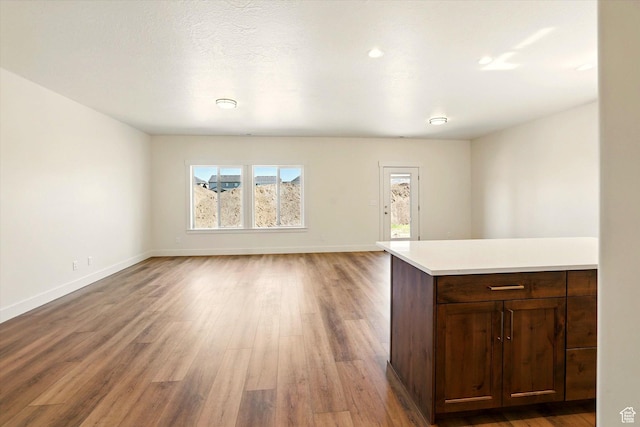 222 W 825 S, Willard, UT 84340 - unfurnished dining area featuring light wood-type flooring and baseboards