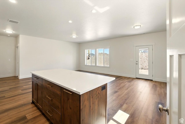222 W 825 S, Willard, UT 84340 - kitchen with dark wood-style floors, light countertops, baseboards, a kitchen island, and recessed lighting