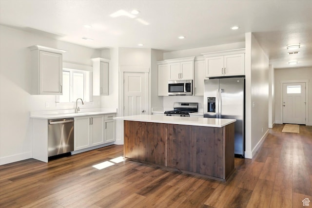 222 W 825 S, Willard, UT 84340 - kitchen with stainless steel appliances, white cabinetry, dark wood-style flooring, baseboards, and recessed lighting