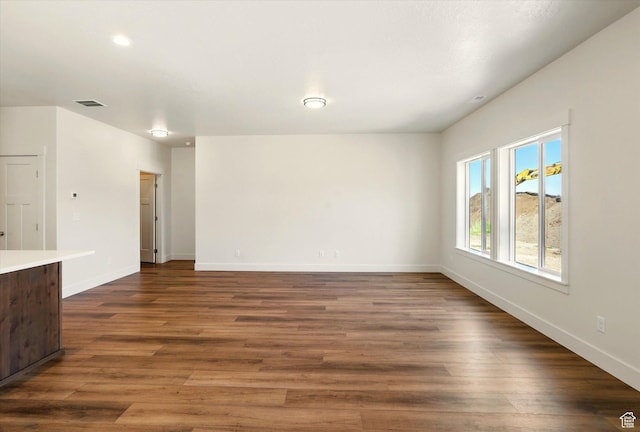 222 W 825 S, Willard, UT 84340 - unfurnished living room with dark wood-style flooring, baseboards, and recessed lighting